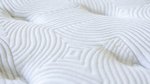 Current Mattress - Up close photo of mattress pillowing and pattern