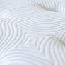 Current Mattress - Up close photo of mattress pillowing and pattern